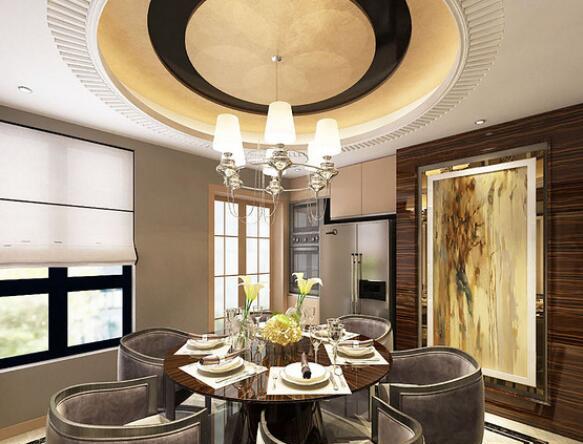 餐厅立面上悬挂的黄晕油画与圆形吊顶形成欧式风格,辉煌而奢华;石材套