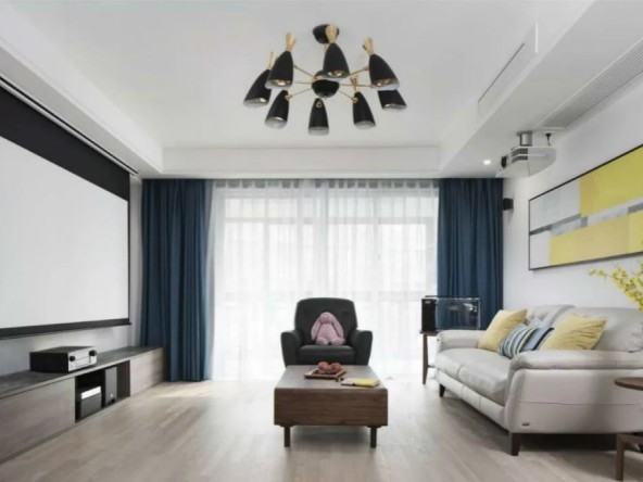 客厅电视墙装上投影幕布,搭配上一套舒适的皮沙发,简约时尚.