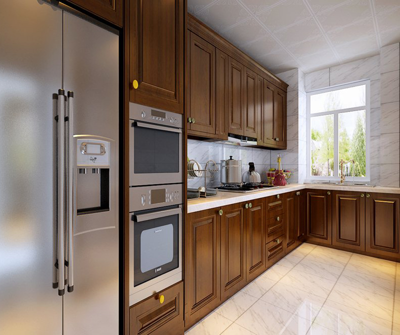 l型的橱柜设计,冰箱与烤箱嵌入到橱柜当中形成一个整体,整个厨房中