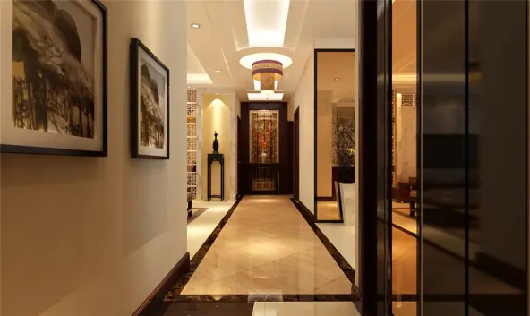 门厅进门为迎宾墙采用了紫檀木,简单几何形体镂空雕和陈设品的装饰花